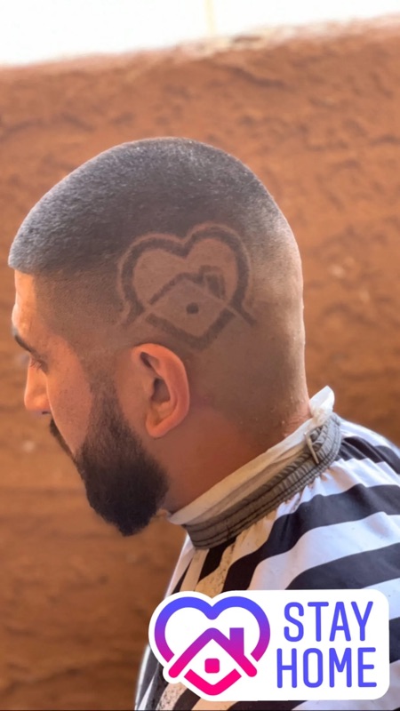 Skin fade with heart design, side view